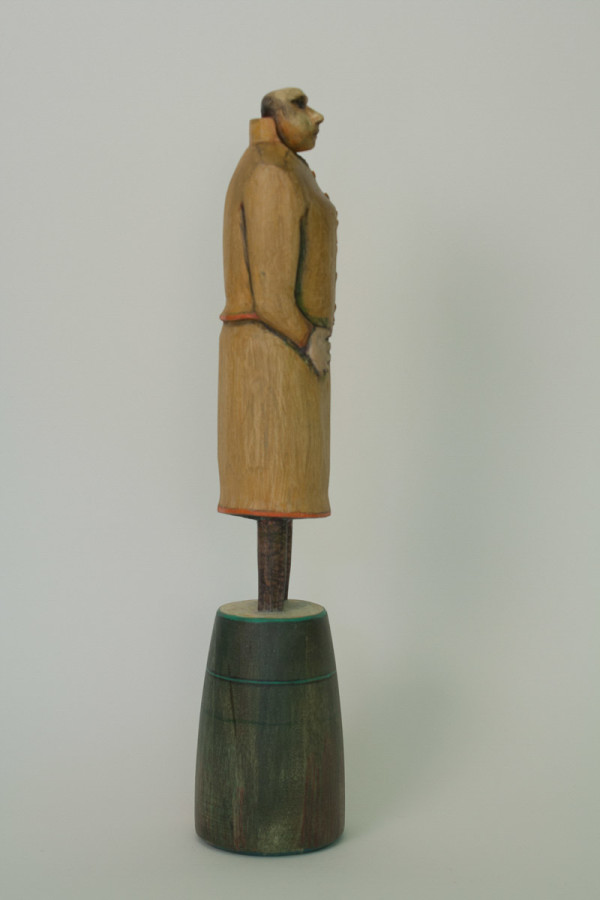 Woman in Ochre Suit (side view) by Eve Whitaker